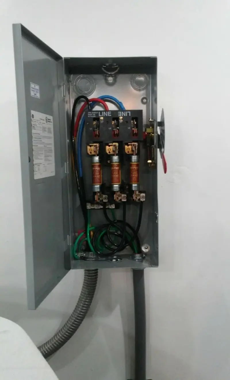 Three-phase disconnect switch installed for Smoke Detector Installation in Aventura